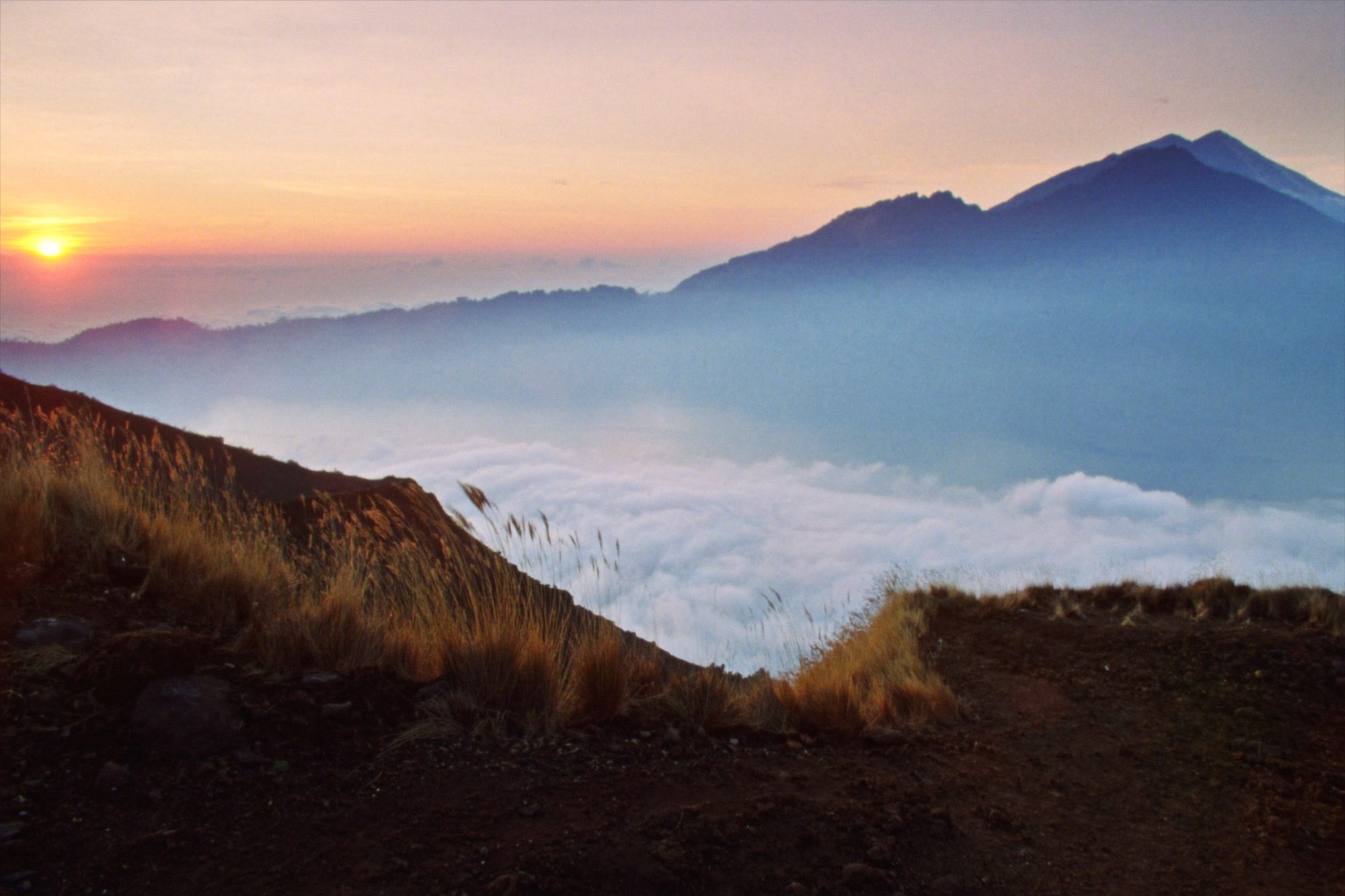 Sunrise from the summit of Mount Batur, above the sea of cloud