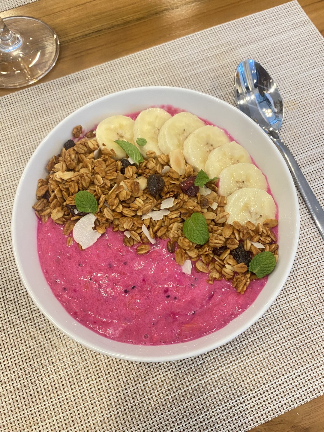 A bright breakfast bowl, dragon fruit and granola
