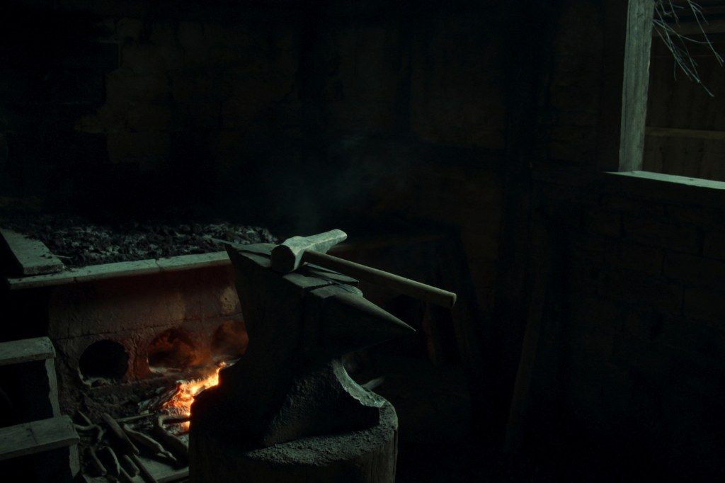 A traditional keris forge, fire and hammered steel