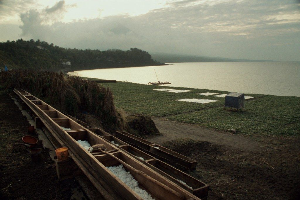 Salt pans on the black sand coast at Amed, Bali