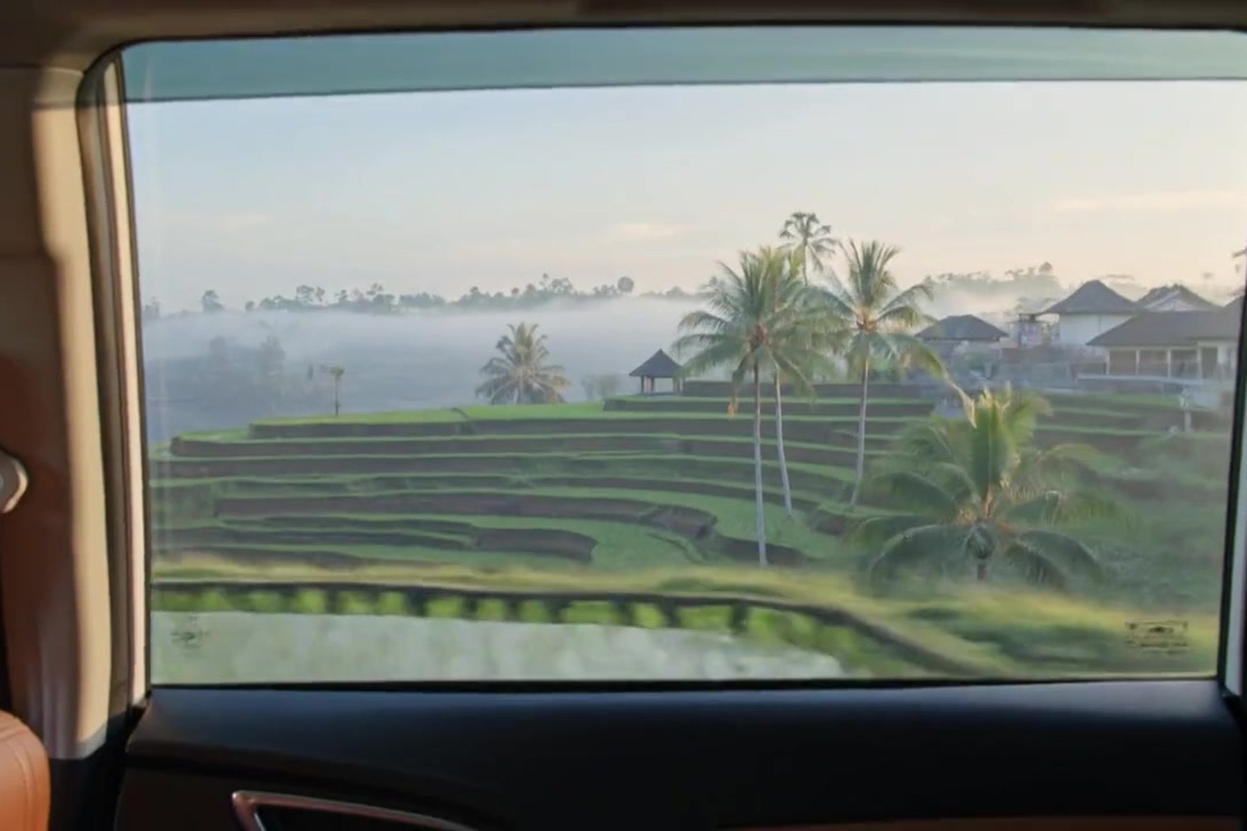 The road up from the airport to Ubud, seen from the back seat