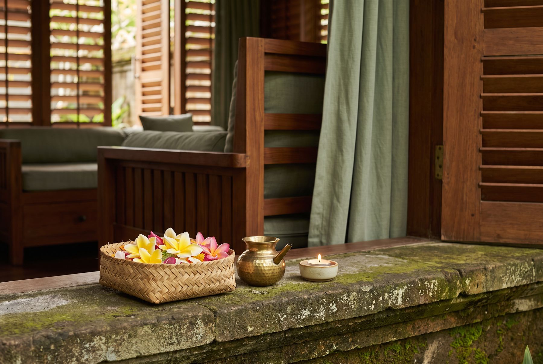 Flowers and holy water laid out for a Balinese blessing