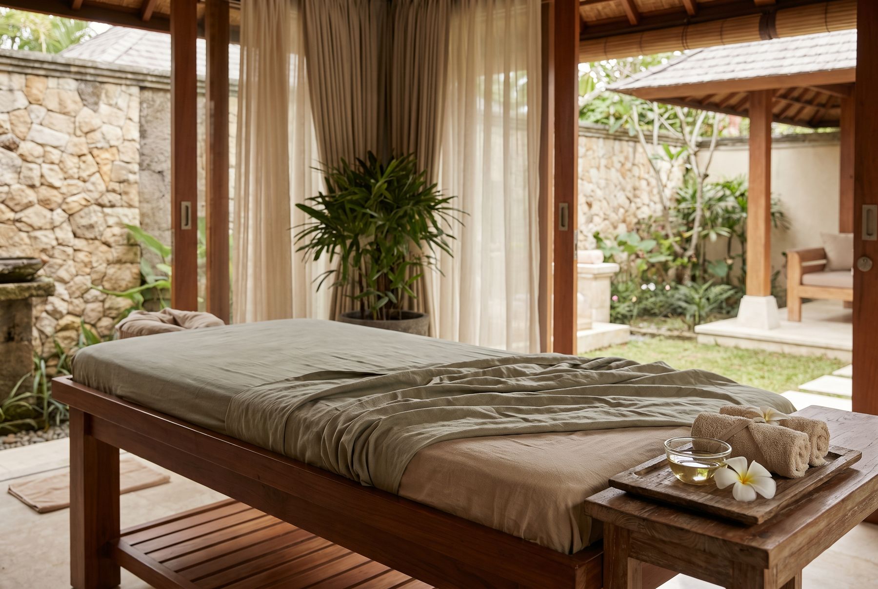 A massage table set on a villa terrace in Ubud